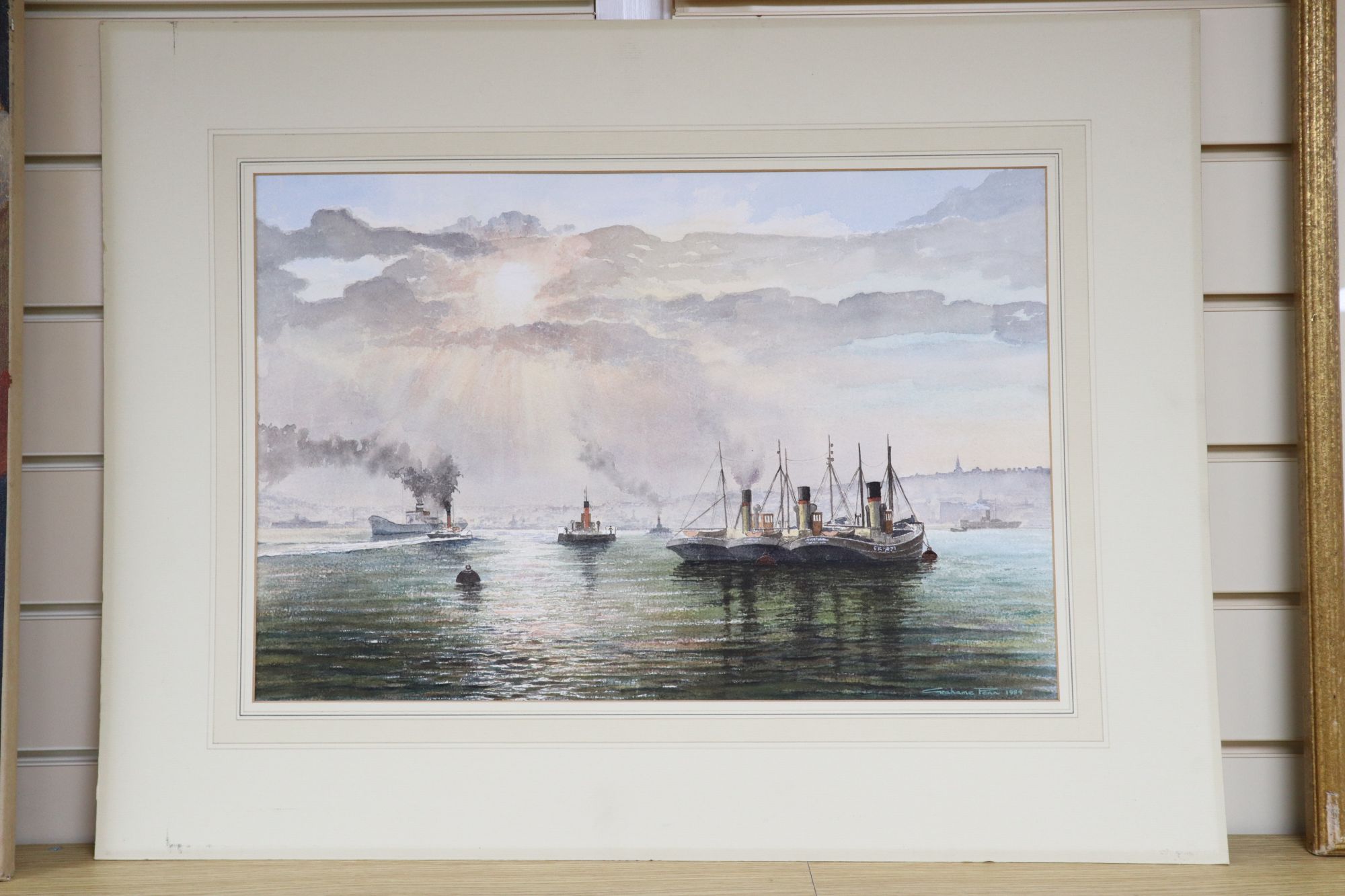 Graham Penn, watercolour, Tug boats in harbour, signed and dated 1984, 35 x 52cm, unframed